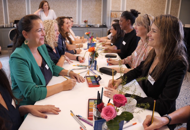 Photo of the Shape Talent team sat around a table