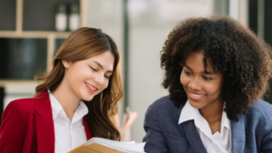 Photo of 2 business women talking